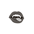 Fanged lips biting a pill